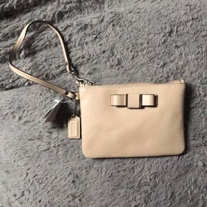 Sand-Colored Coach leather Wristlet Clutch w/ Bow